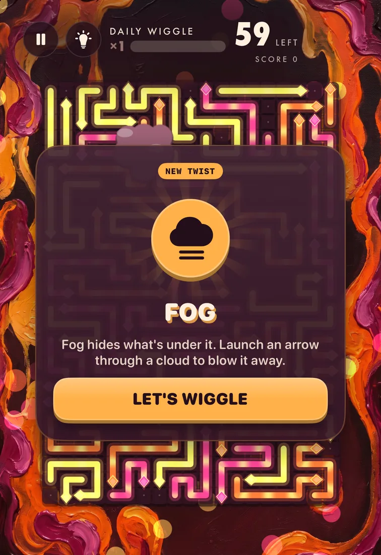 The Daily Wiggle in Lava Lamp: molten orange and pink pieces around a card that introduces fog: Fog hides what's under it. Launch an arrow through a cloud to blow it away.